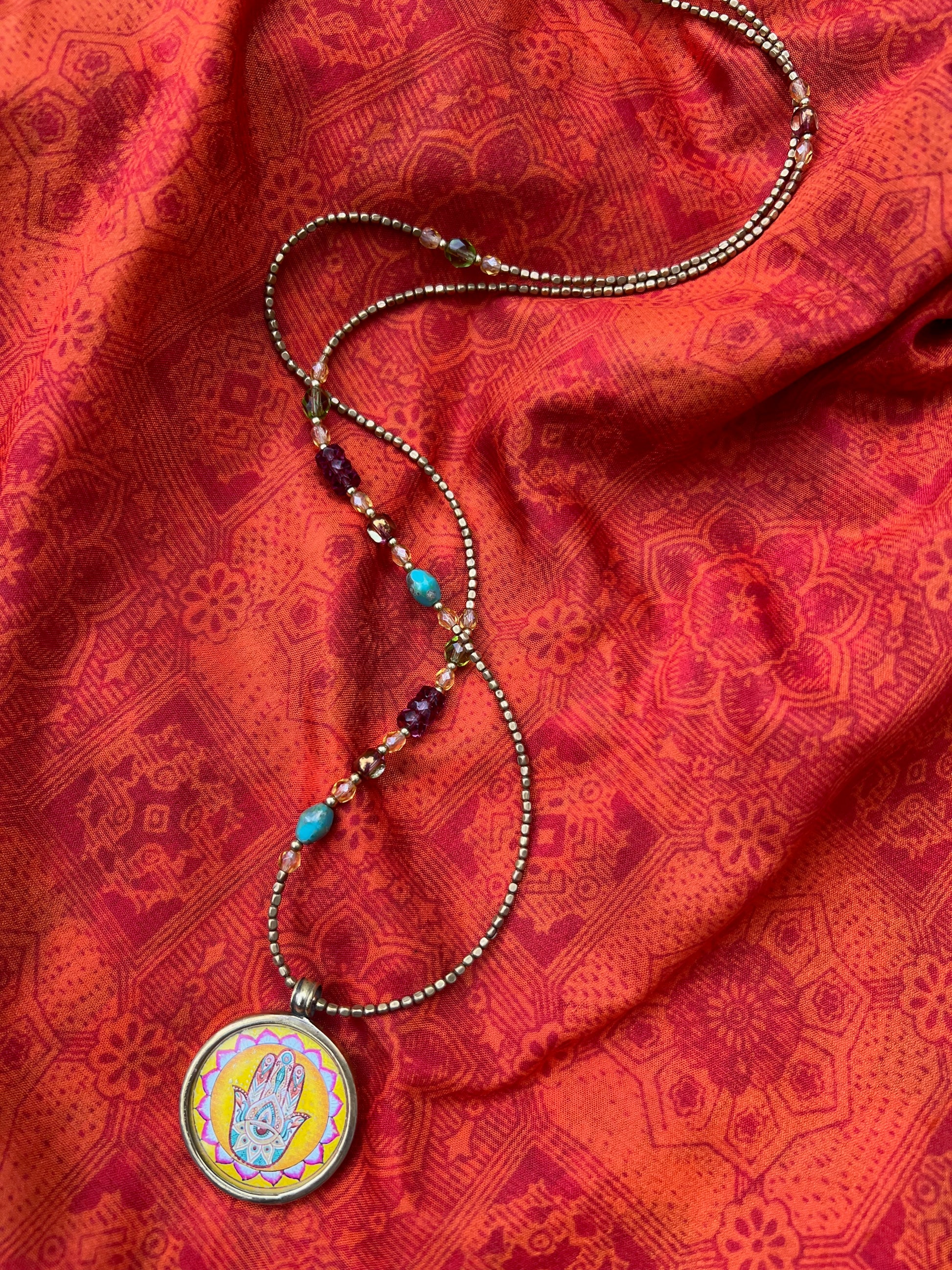 Ethnic Soul Collective hand painted Hamsa necklace brass and glass frame hand beaded with Czech glass and brass beads 40cm length