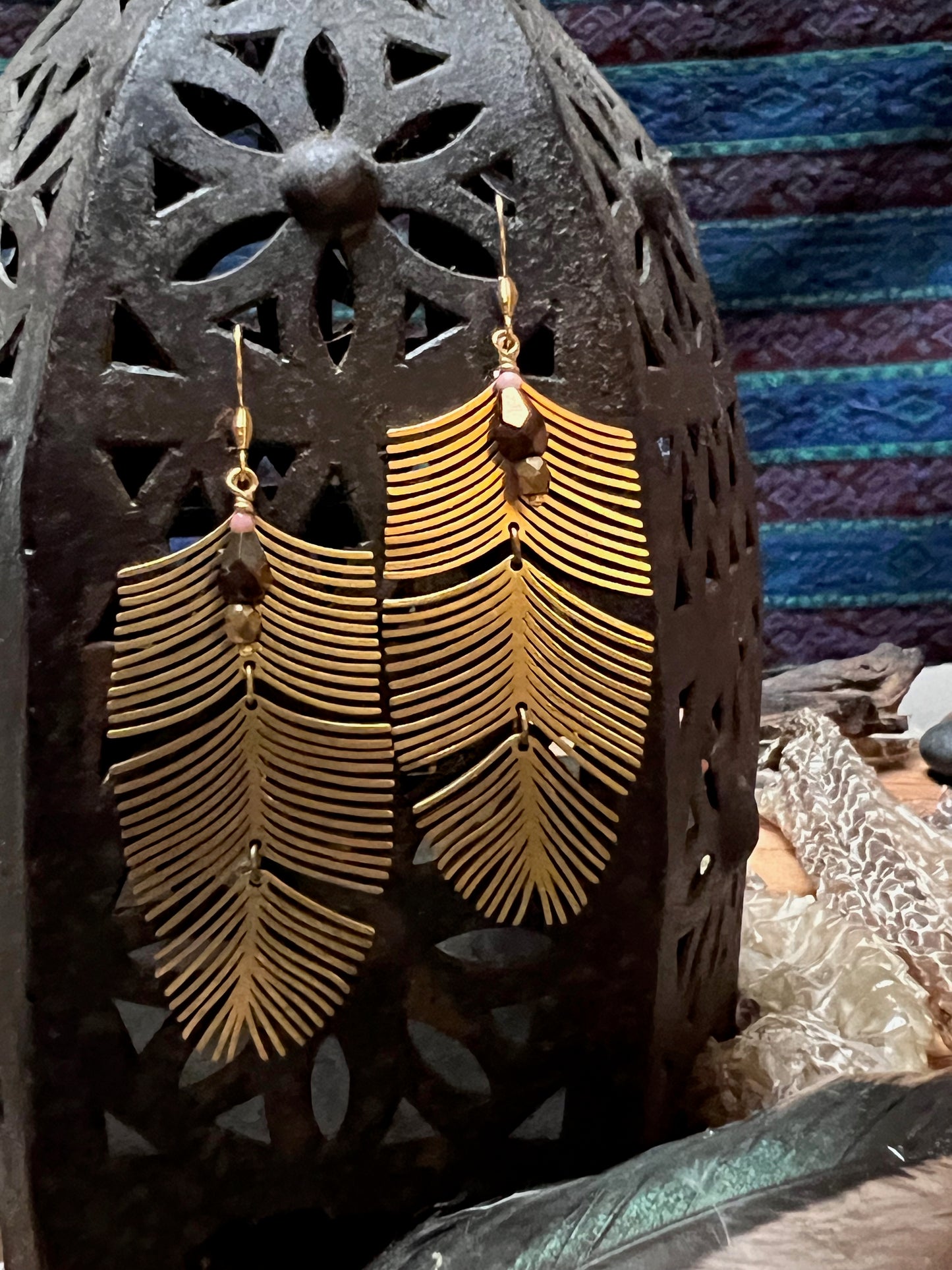 Ethnic Soul Collective three-part dangly brass leaf earrings with Czech glass beads. Handcrafted design with moving elements and sparkling detail.